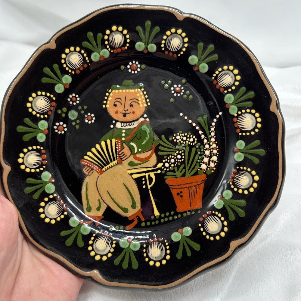 Vintage hand-painted ceramic plate made by
W. Hebi, from Hasle, Switzerland